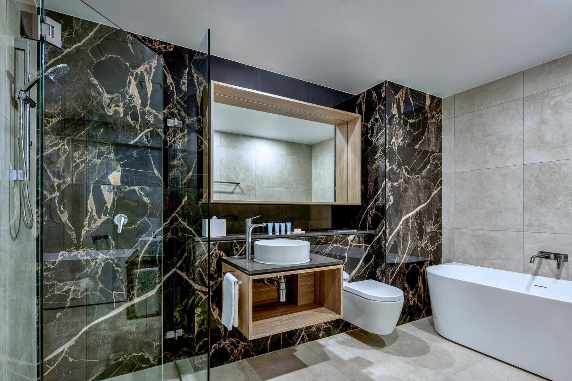 Meriton Suites Liverpool Exteriör bild Bathroom