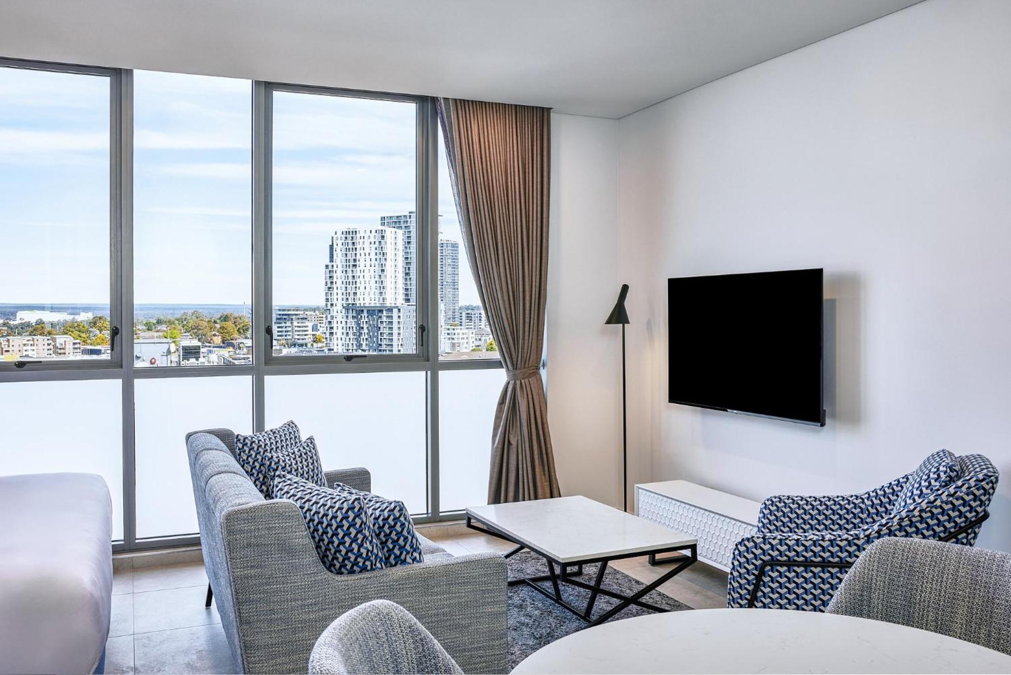 Meriton Suites Liverpool Exteriör bild Living room